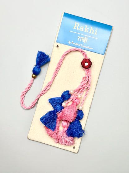 Elegant Handmade Lumba Rakhi: A Symphony of Blue and Pink Color